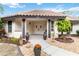 Inviting front entrance with double doors, manicured garden beds, stone walkway, and prominent house number at 265 Beaver Ct, Venice, FL 34292