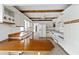 Open-concept kitchen features wooden island countertop, white appliances, and ample counter space at 265 Beaver Ct, Venice, FL 34292
