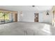 Open living space with access to a patio area and natural light at 265 Beaver Ct, Venice, FL 34292