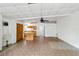 Open living space featuring a kitchen and an expansive room with unique flooring at 265 Beaver Ct, Venice, FL 34292