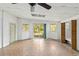 Expansive living space featuring a sliding glass door, windows and a double door closet at 265 Beaver Ct, Venice, FL 34292