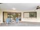 Covered outdoor patio with serving bar that leads to backyard at 265 Beaver Ct, Venice, FL 34292