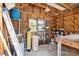 Interior view of shed with work table, shelving and water filtration system at 265 Beaver Ct, Venice, FL 34292