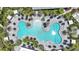 Aerial shot of a uniquely shaped community pool with multiple lounge seating and cabanas at 26930 Lark Ct, Punta Gorda, FL 33955