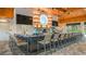 Stylish bar featuring modern design, ample seating, and well-stocked shelves for an upscale experience at 26936 Lark Ct, Punta Gorda, FL 33955