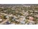 Overhead view of a residential area, highlighting homes with private pools and mature landscaping at 2903 Mayflower St, Sarasota, FL 34231