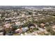 Community aerial view showcasing residential homes, manicured lawns, and mature shade trees at 2903 Mayflower St, Sarasota, FL 34231