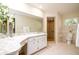 Bright bathroom with walk in shower and large vanity at 2903 Mayflower St, Sarasota, FL 34231