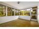 Light filled sunroom offers bright views with multiple windows and ample space at 2903 Mayflower St, Sarasota, FL 34231