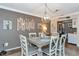 Dining room featuring decor with views into the kitchen at 303 Grayston Pl # C133, Sun City Center, FL 33573