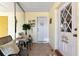 Charming front porch with coastal decor, tiled floor, and a cozy seating area at 303 Grayston Pl # C133, Sun City Center, FL 33573