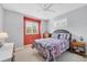 Cozy bedroom with a full bed, window, dresser, and soft decor at 308 28Th W St, Palmetto, FL 34221
