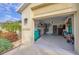 Spacious two car garage providing ample storage, a door to the house and natural light at 308 28Th W St, Palmetto, FL 34221