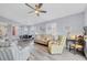 Spacious living room connected to a dining area, ideal for entertaining and Gathering gatherings at 308 28Th W St, Palmetto, FL 34221