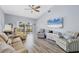 Well-lit living room featuring an expansive floor, providing an open and airy atmosphere at 308 28Th W St, Palmetto, FL 34221