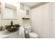 Stylish bathroom with a unique vessel sink, modern fixtures, and decorative touches at 3231 Beneva Rd # 101, Sarasota, FL 34232