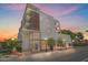 Modern condo building featuring private balconies and sleek architectural design at 332 Cocoanut Ave # 406, Sarasota, FL 34236