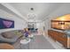 A spacious living area combines modern comfort and style with an open-concept dining space at 332 Cocoanut Ave # 406, Sarasota, FL 34236