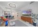This combined living and dining space features modern lighting, stylish decor, and an open layout at 332 Cocoanut Ave # 406, Sarasota, FL 34236