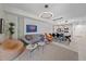 Open-concept living and dining area boasts modern decor, stylish seating, and plenty of natural light at 332 Cocoanut Ave # 406, Sarasota, FL 34236