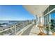 Expansive balcony with glass railings offering stunning marina and city views, ideal for outdoor relaxation at 340 S Palm Ave # 152, Sarasota, FL 34236