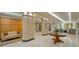 Well-lit lobby with seating areas, tile flooring, and decorative accents at 340 S Palm Ave # 152, Sarasota, FL 34236