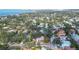 Aerial view of home and neighborhood; proximity to water and city at 3716 Camino Real, Sarasota, FL 34239