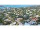 Sprawling property with mature trees on a street ending at the bay, near open water and beaches at 3716 Camino Real, Sarasota, FL 34239