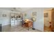 Bedroom featuring a bookshelf and an attached bath at 3716 Camino Real, Sarasota, FL 34239