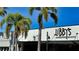 Libby's Neighborhood Brasserie features a modern facade and inviting atmosphere at 3716 Camino Real, Sarasota, FL 34239