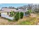 A spacious backyard featuring a screened-in pool, white picket fence, and lush greenery at 406 116Th E St, Bradenton, FL 34212
