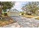 Quaint one-story home with long driveway and attached two-car garage at 406 116Th E St, Bradenton, FL 34212