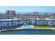 Waterfront condos with a community pool and docks providing residents a resort-style living experience at 4390 Exeter Dr # I305, Longboat Key, FL 34228