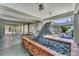 Welcoming entrance featuring a dolphin statue in a brick planter with outdoor water views at 4390 Exeter Dr # I305, Longboat Key, FL 34228