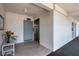 Hallway with elevator access to storage room at 4390 Exeter Dr # I305, Longboat Key, FL 34228