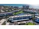 Aerial view of waterfront condominiums offering boating access and a community pool, near the beach at 4400 Exeter Dr # J-201, Longboat Key, FL 34228