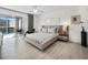 Bedroom featuring neutral colors, and a view of the outside at 4400 Exeter Dr # J-201, Longboat Key, FL 34228