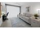 Bright living room featuring neutral colors and a view of the outside at 4400 Exeter Dr # J-201, Longboat Key, FL 34228