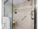 Glass enclosed shower with seating and soap nook at 4400 Exeter Dr # J-201, Longboat Key, FL 34228