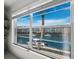 View of canal with boats docked outside window at 4400 Exeter Dr # J-201, Longboat Key, FL 34228