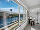 Waterfront view from inside the home at 4400 Exeter Dr # J-201, Longboat Key, FL 34228