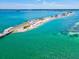 Gorgeous aerial view of ocean with a road and beach at 460 S Paula Dr # 304, Dunedin, FL 34698