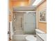 Well-lit bathroom featuring a shower and tub combination with modern fixtures at 460 S Paula Dr # 304, Dunedin, FL 34698