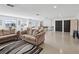 Community common room featuring couches, tables, and a billiards table at 460 S Paula Dr # 304, Dunedin, FL 34698