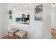 Kitchen featuring stainless appliances, and a bar with seating at 460 S Paula Dr # 304, Dunedin, FL 34698