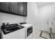 Laundry room with modern washer and dryer at 4609 Antrim Dr, Sarasota, FL 34240