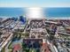 Beautiful aerial view of beachfront community and the ocean at 6263 Midnight Pass Rd # 105, Sarasota, FL 34242