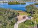 Community outdoor grill and picnic area offering an inviting space for gatherings near the waterfront at 6263 Midnight Pass Rd # 105, Sarasota, FL 34242