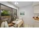 Cozy dining area with a sliding door that leads to an outdoor patio at 6650 Schooner Bay Cir # 6650, Sarasota, FL 34231