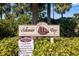 Community sign for Schooner Bay featuring manicured landscaping and rules for the community at 6650 Schooner Bay Cir # 6650, Sarasota, FL 34231
